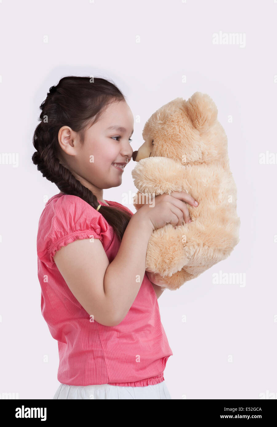 Small girl and teddy bear hi-res stock photography and images - Alamy