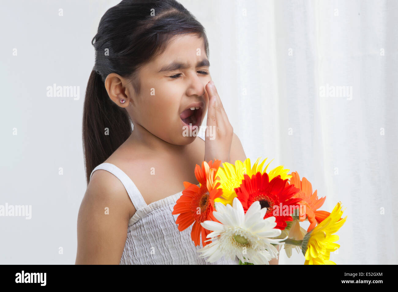 Girl sneezing flowers hires stock photography and images Alamy