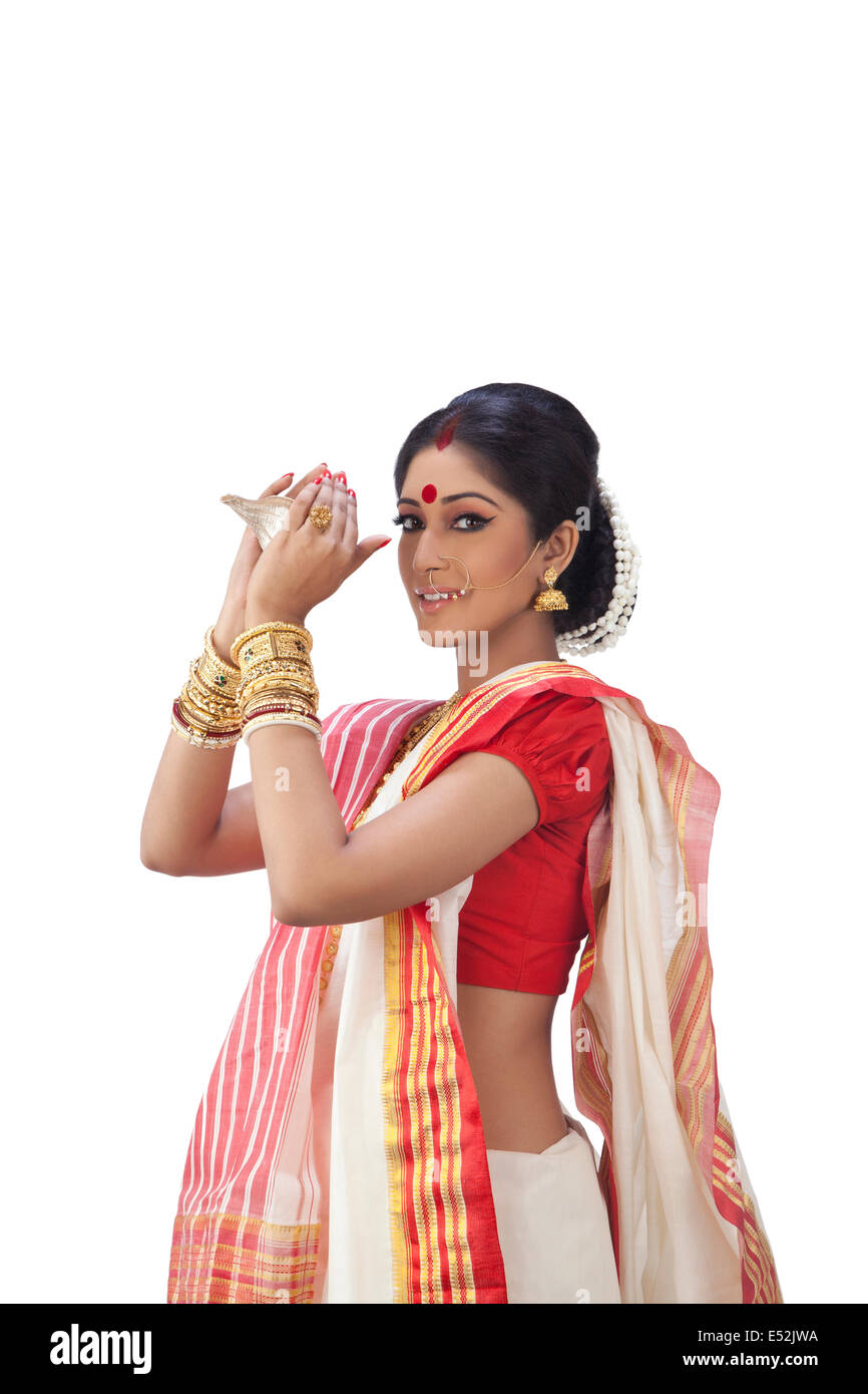 Portrait of Bengali woman holding a conch shell Stock Photo Alamy
