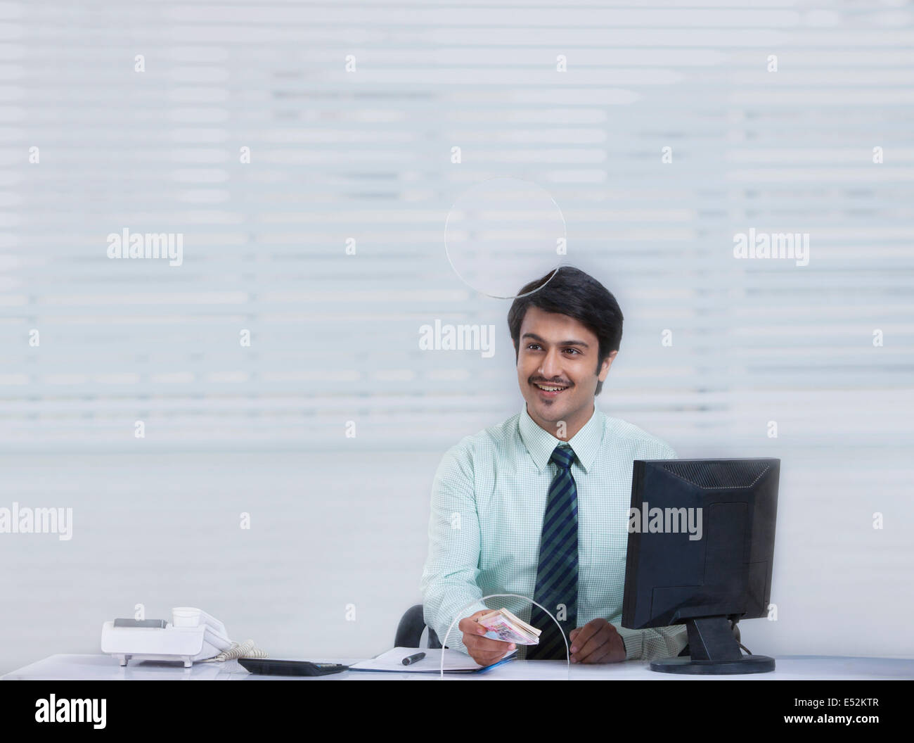 Portrait of a bank employee Stock Photo - Alamy