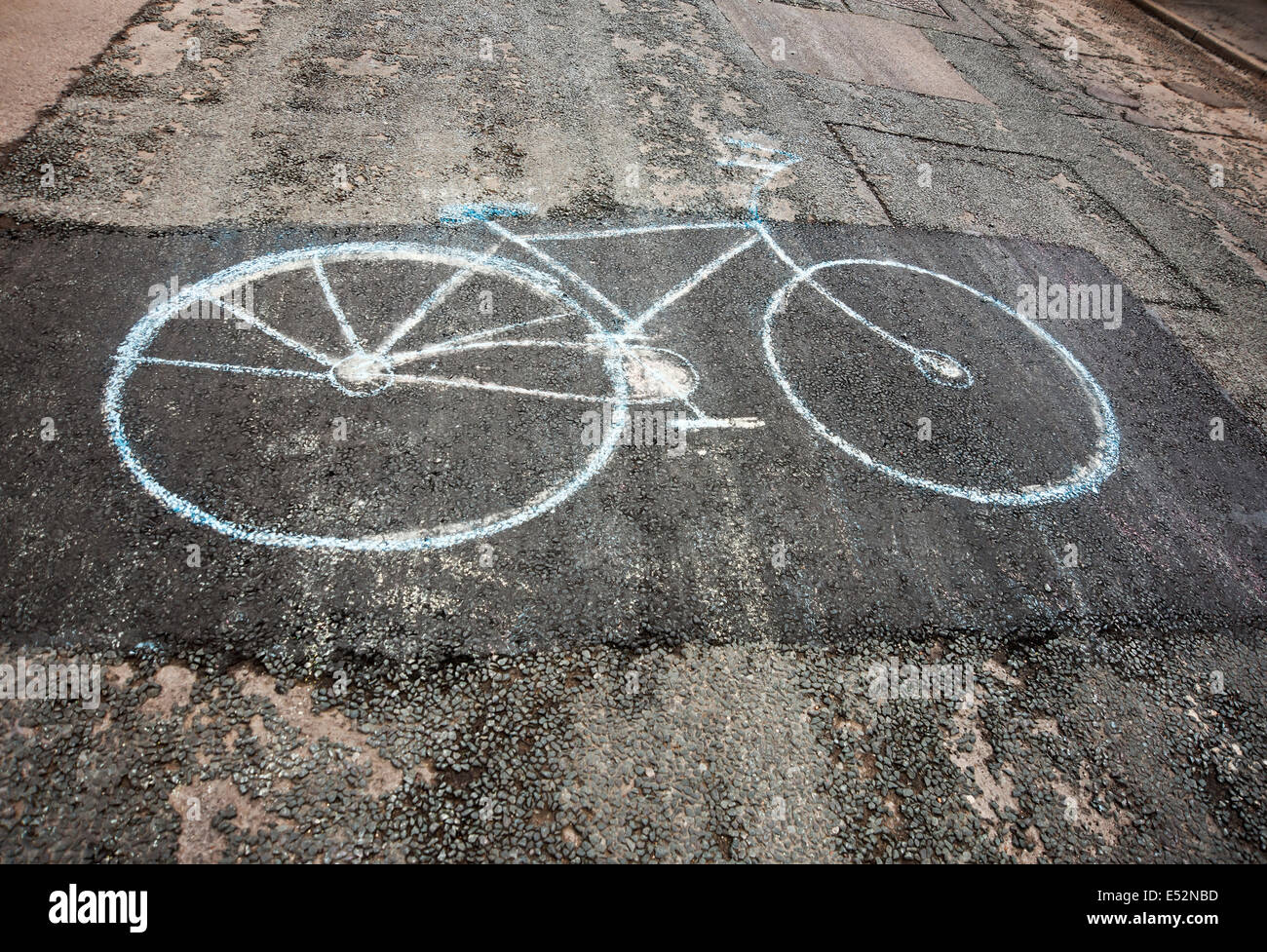 Close up of a Bike drawn on road in chalk England UK United Kingdom GB Great Britain Stock Photo