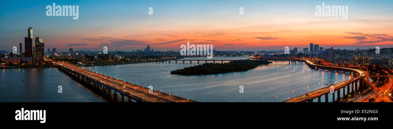 A colorful sunset over the Yeouido business district and the Han River of Seoul, South Korea. Stock Photo