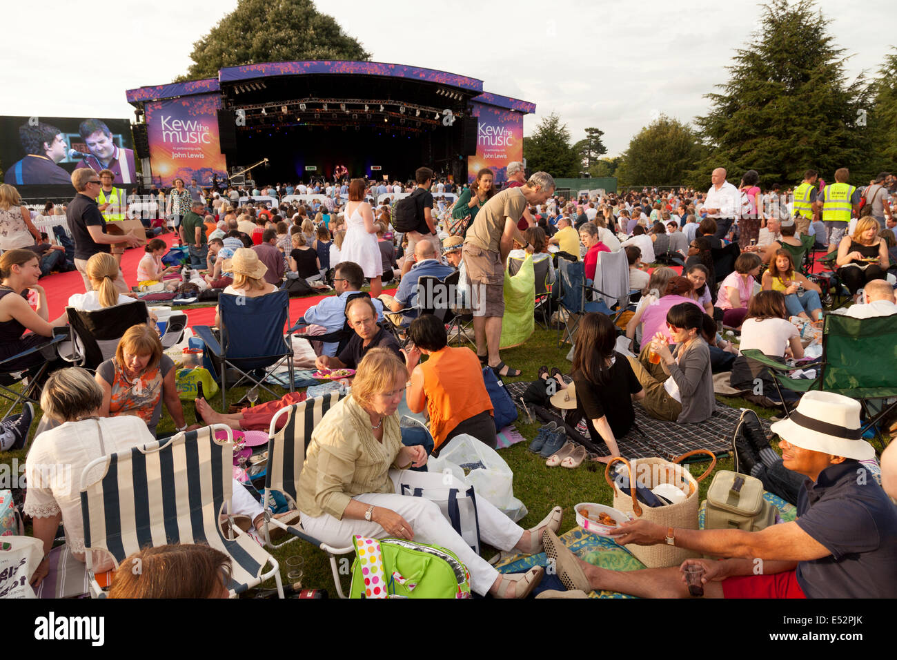 People watching an open air outdoor summer concert at Kew the Music