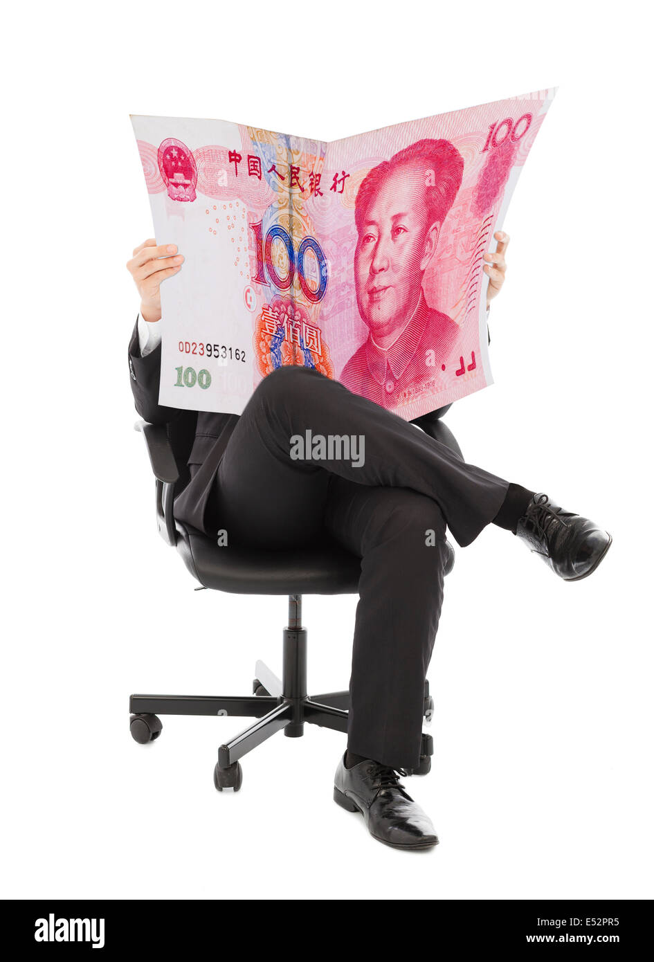 Business people sitting on a chair with china currency in hands Stock Photo
