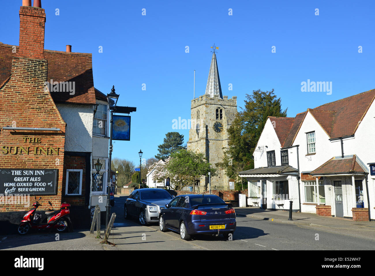 St Lawrence Church and The Sun Inn, The High Street, Chobham, Surrey, England, United Kingdom Stock Photo