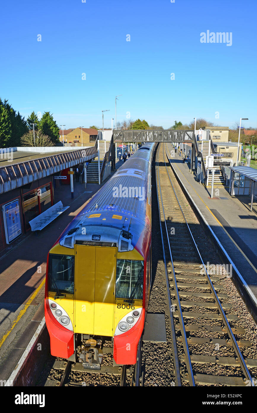 Train on platform, Egham Railway Station, Station Road, Egham, Surrey, England, United Kingdom Stock Photo