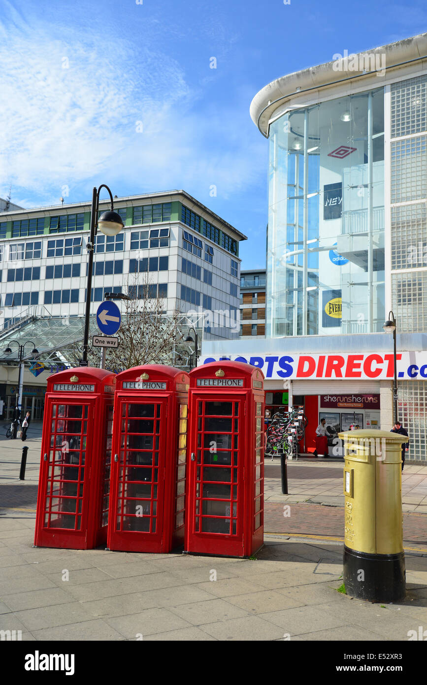 Red telephone boxes and gold pillar box, High Street, Uxbridge, London Borough of Hillington, Greater London, England, United Kingdom Stock Photo