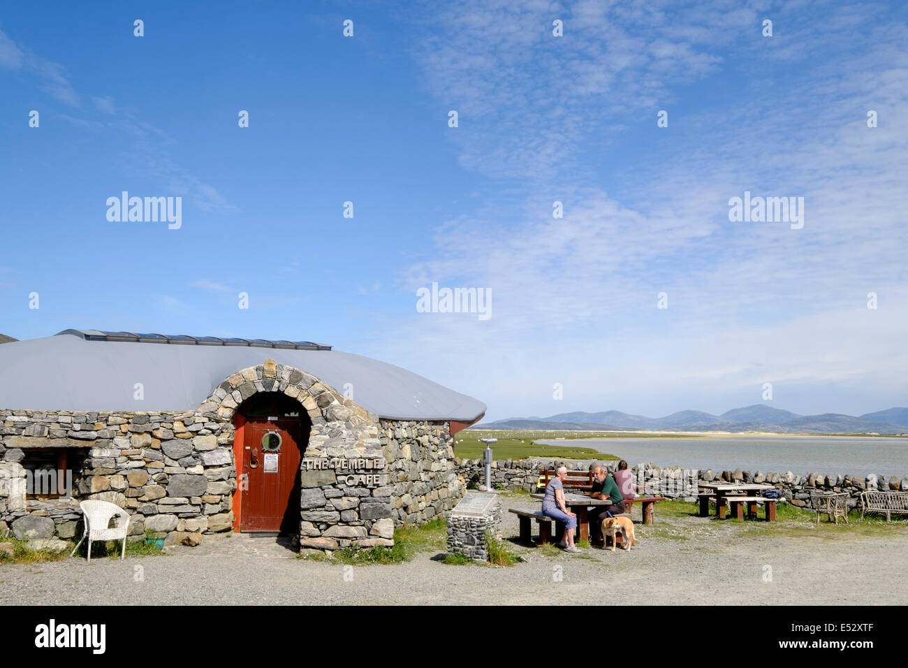 Customers outside The Temple cafe with scenic sea view on coast. Northton Isle of Harris Outer Hebrides Western Isles Scotland UK Britain Stock Photo