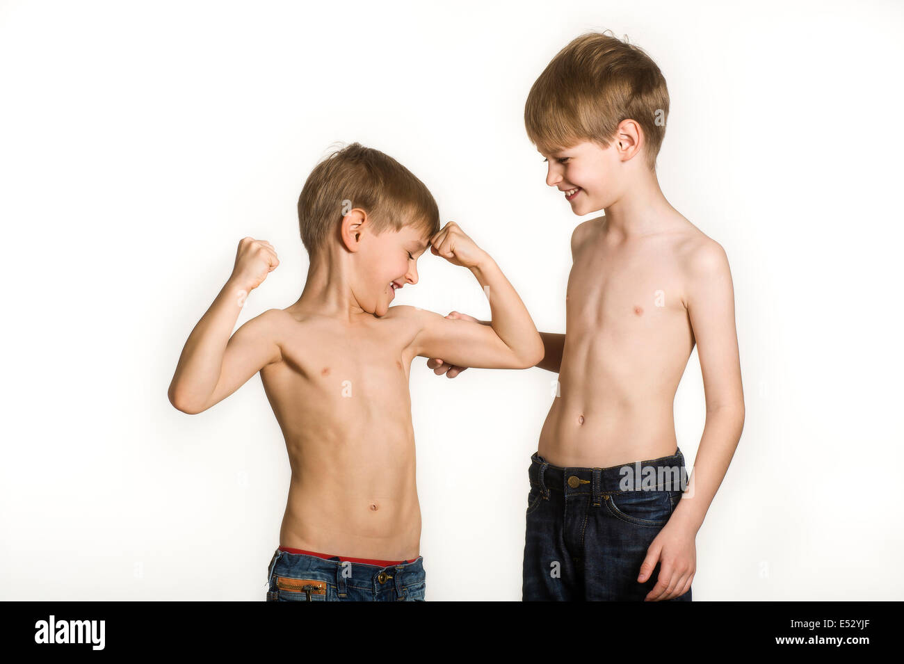 young little naked kid boys an girls boys half-naked posing Stock Photo - Alamy