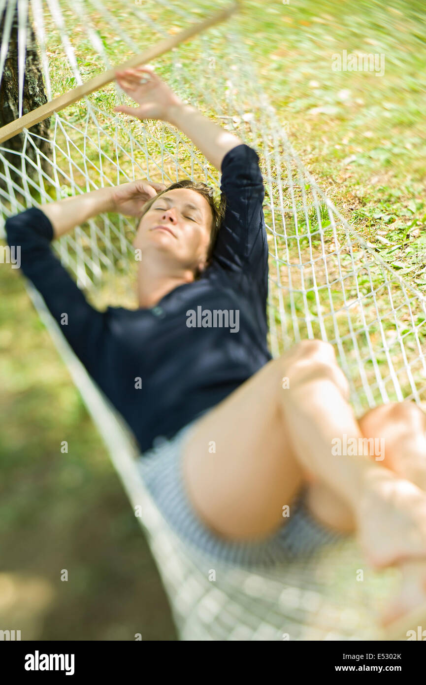 woman relaxing in the hammock Stock Photo - Alamy