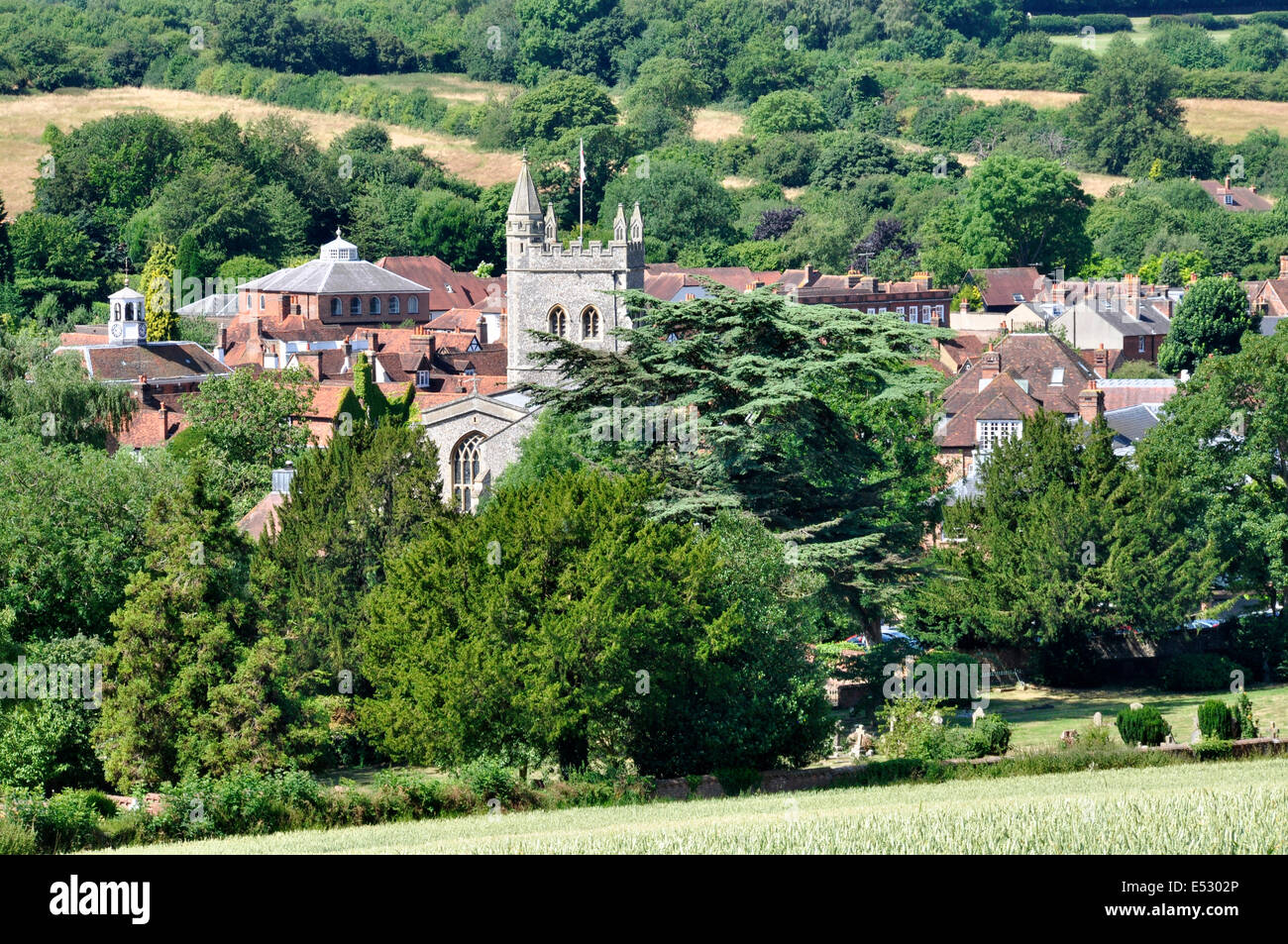 Bucks Chiltern Hills - view over Amersham Old Town - russet rooftops - church tower - fine setting amid trees - on HS2 route Stock Photo