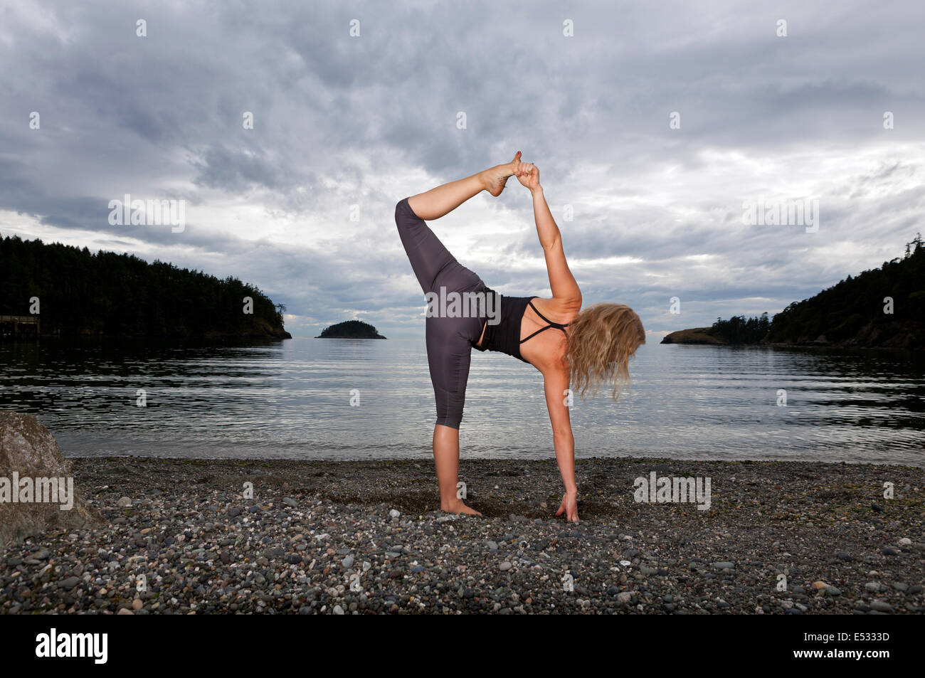 WASHINGTON - Yoga instructor Carly Hayden warming up. Stock Photo