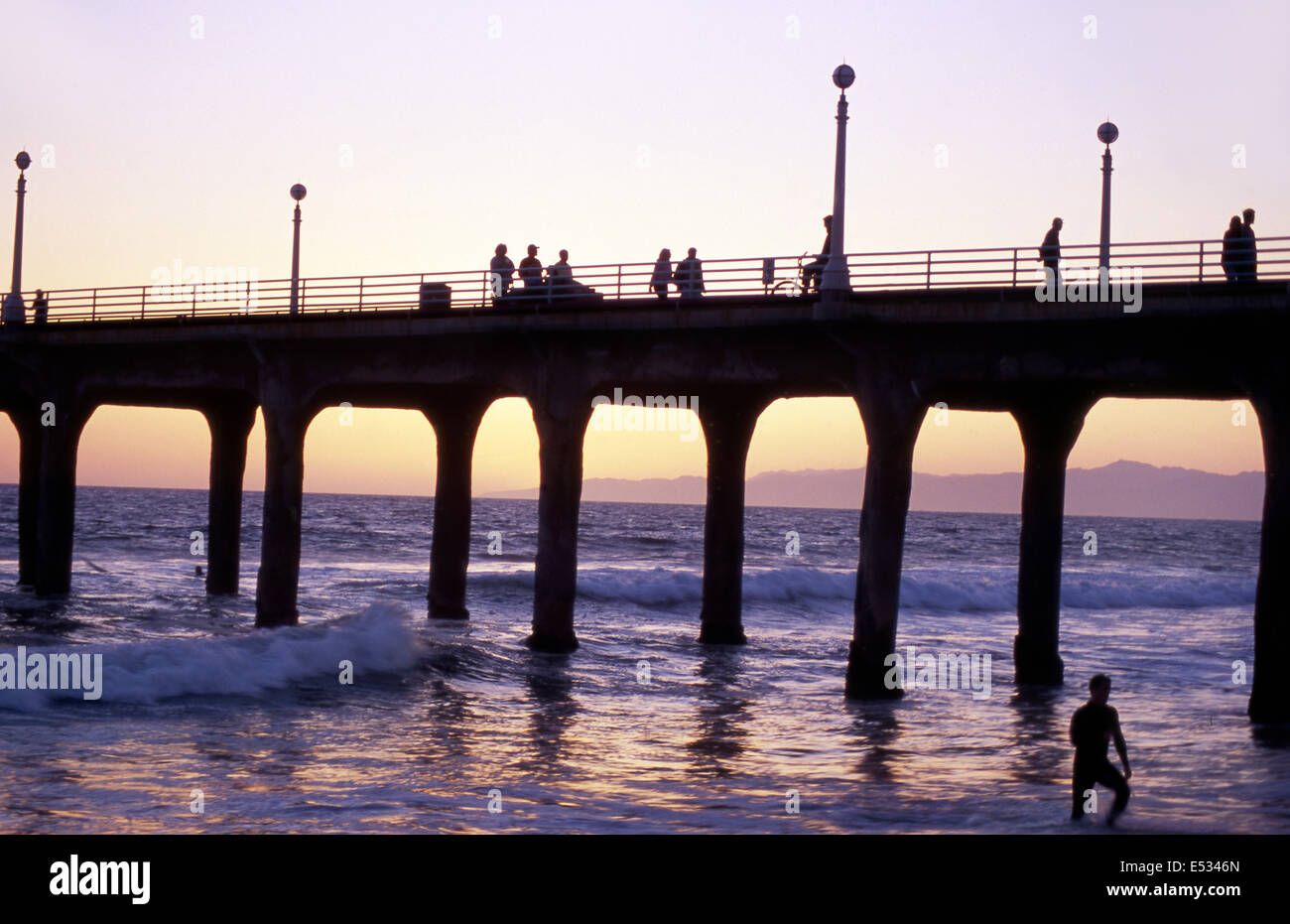 Sunset at the Manhattan Beach pier in Southern California Stock Photo