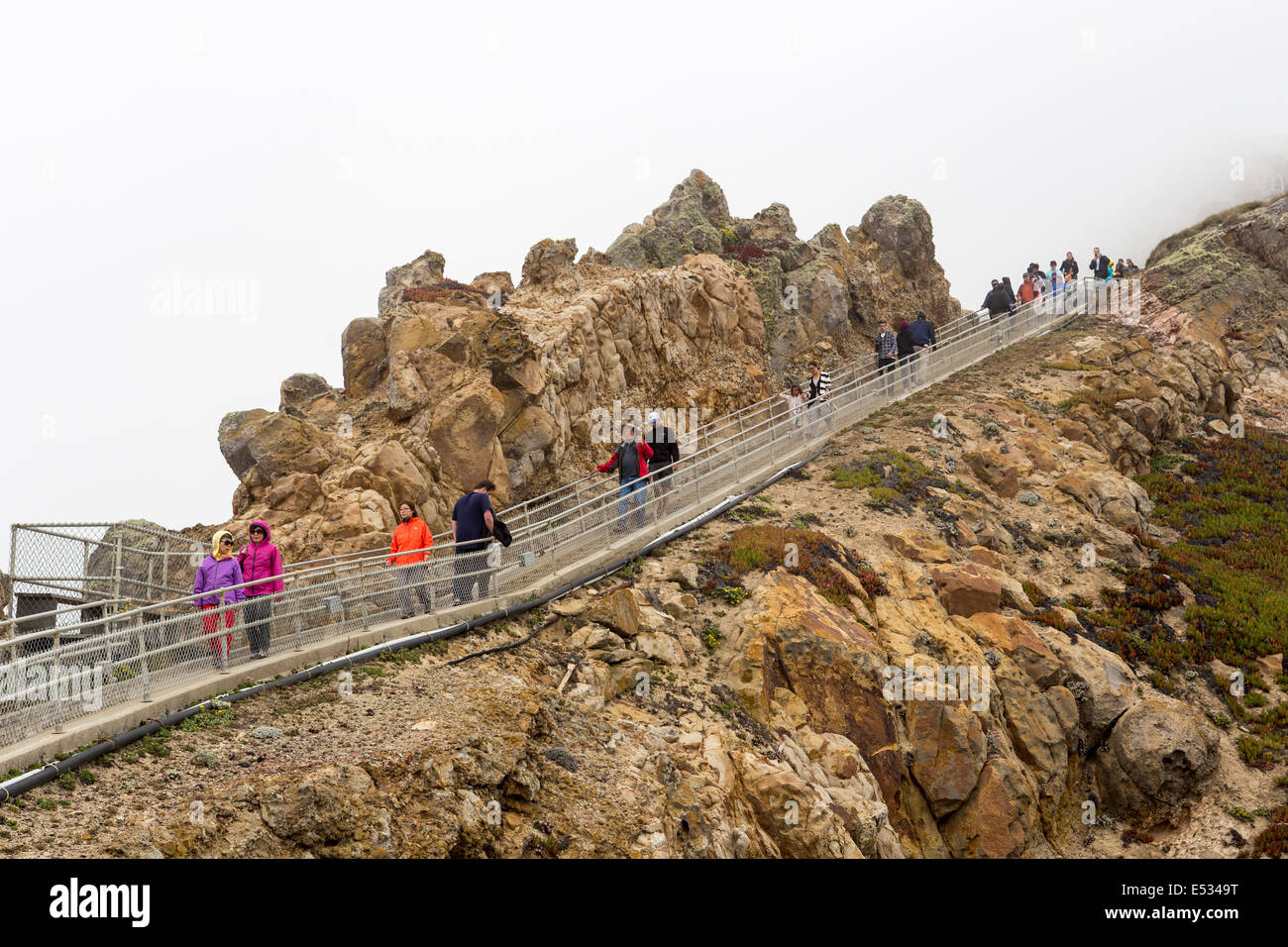 People tourists on stairway to Point Reyes Lighthouse in Point Reyes National Seashore Marin County California United States Nor Stock Photo