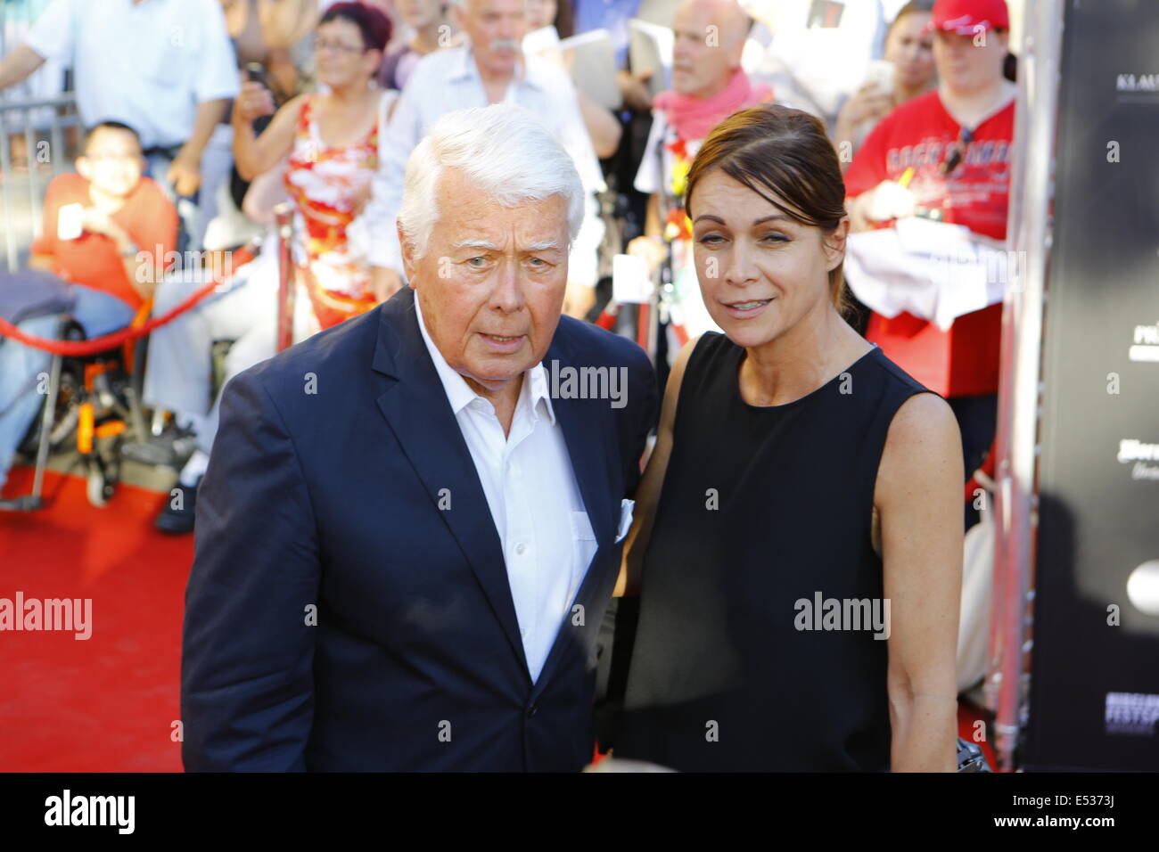 Actor and director Peter Weck (left) poses with his daughter Barbara Weck  (right) for the cameras on the red carpet. Celebrities from politics,  sports and film came to Worms, to see the