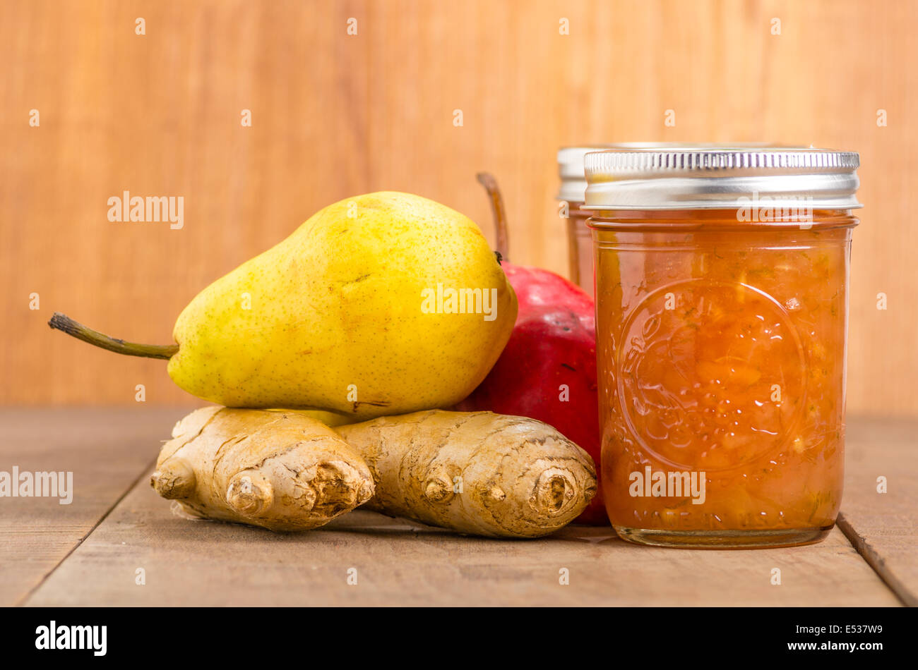 Pear ginger jam in mason jars with red and yellow pears Stock Photo Alamy