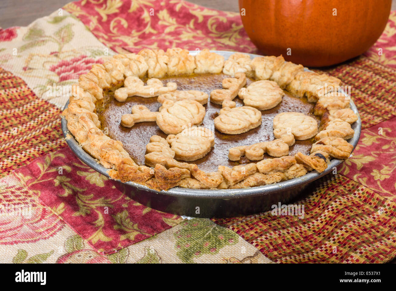 Pumpkin Pie With Dough Decorations And An Orange Pumpkin Stock