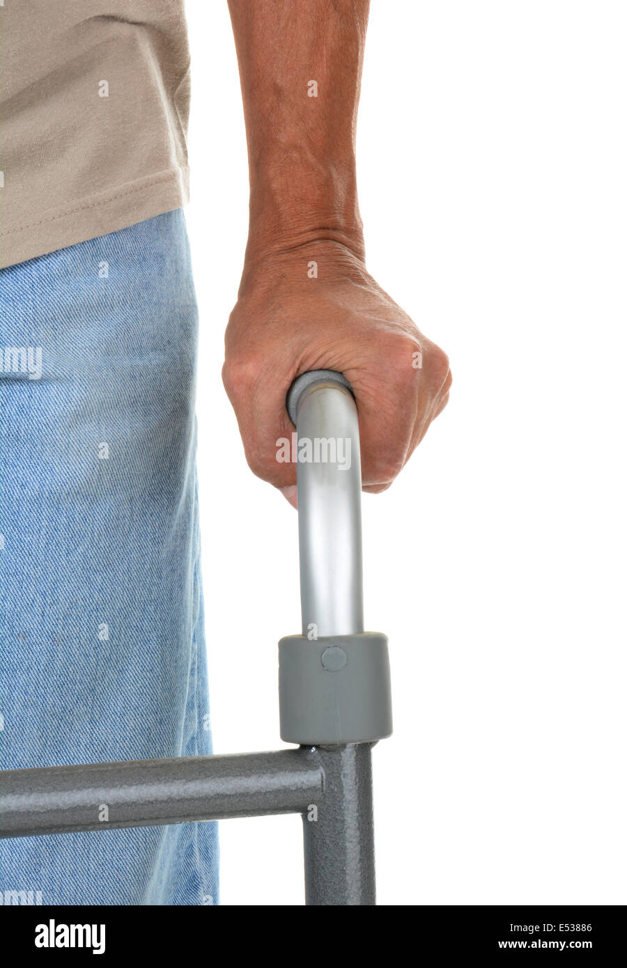 Closeup of a man using a disability walker. Part of the man's left side and a hand on the walker hand grip only. Vertical format Stock Photo