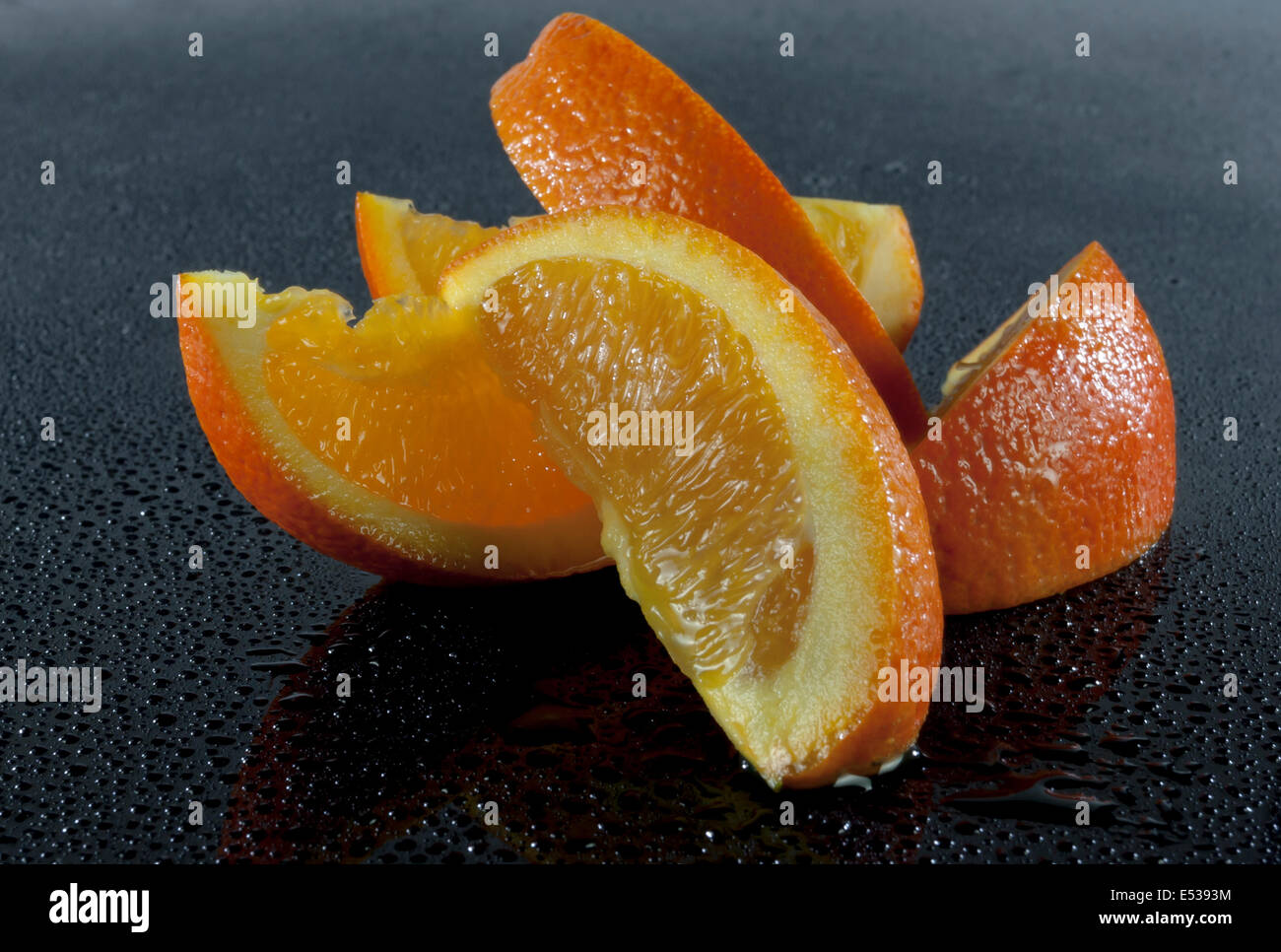 Orange juice splash on black hi-res stock photography and images - Alamy