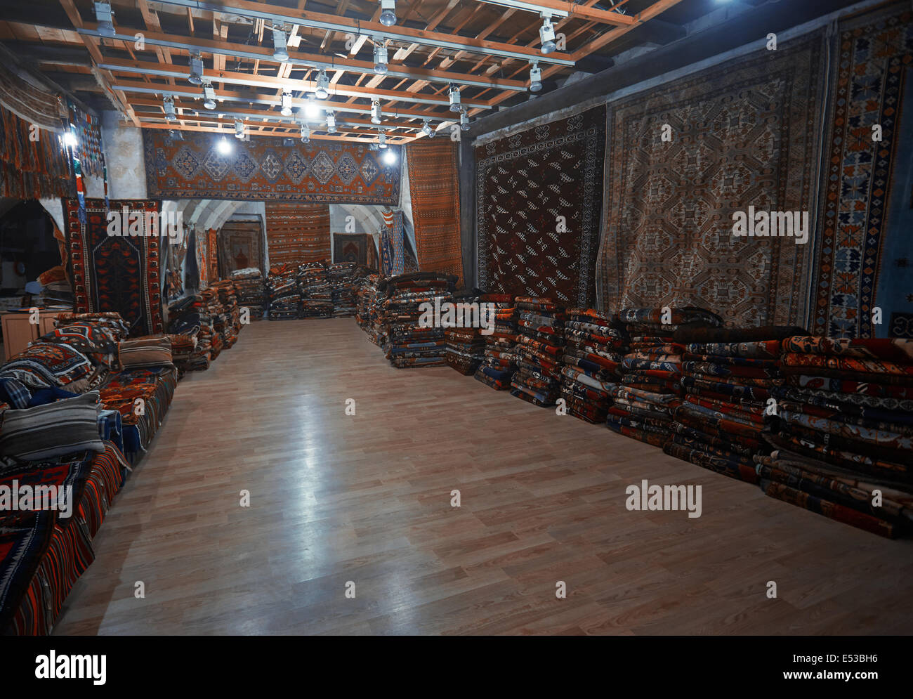Oriental carpets at antique store Stock Photo Alamy