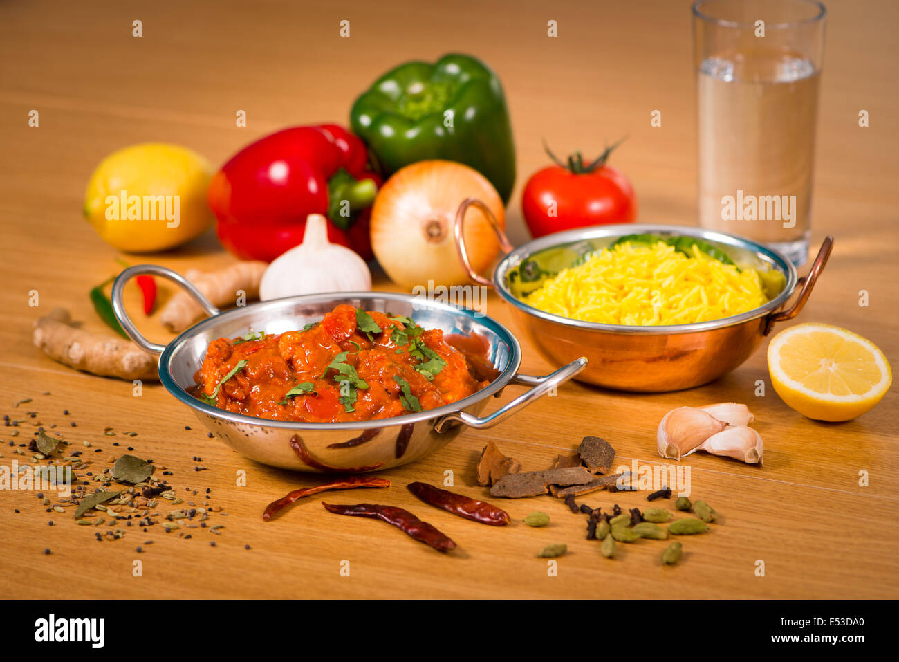 Indian food chicken jalfrezi curry in balti dish decoration set of