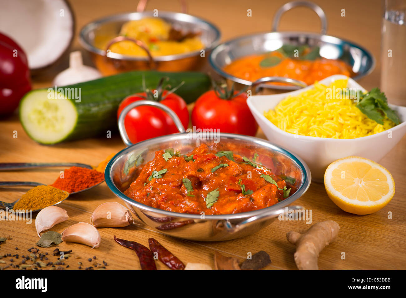 Indian food chicken jalfrezi curry in balti dish decoration set of