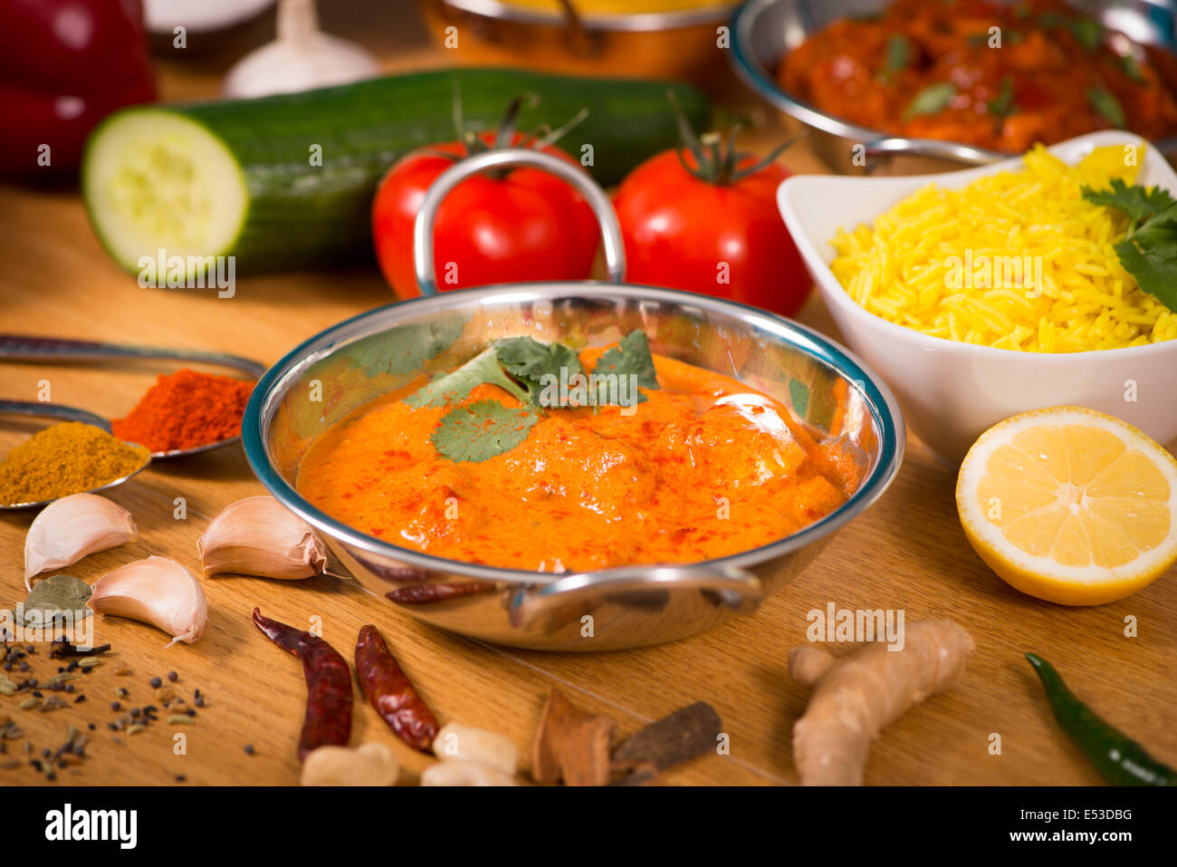 Indian food chicken jalfrezi curry in balti dish decoration set of