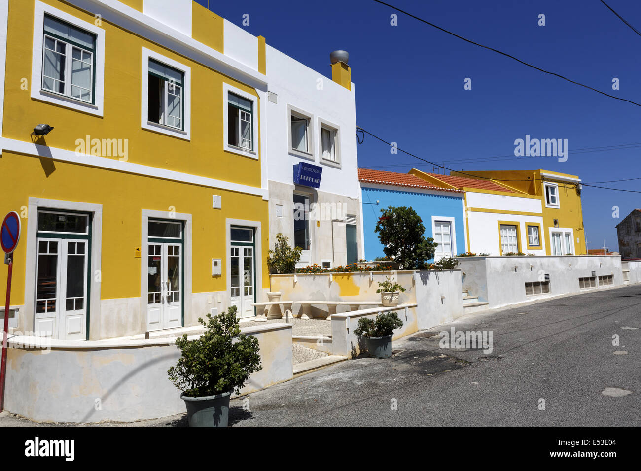 Brightly painted houses in Peniche Portugal Stock Photo