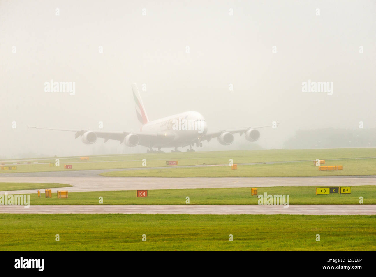 Manchester Airport in rain and fog arrivals and departures Stock Photo