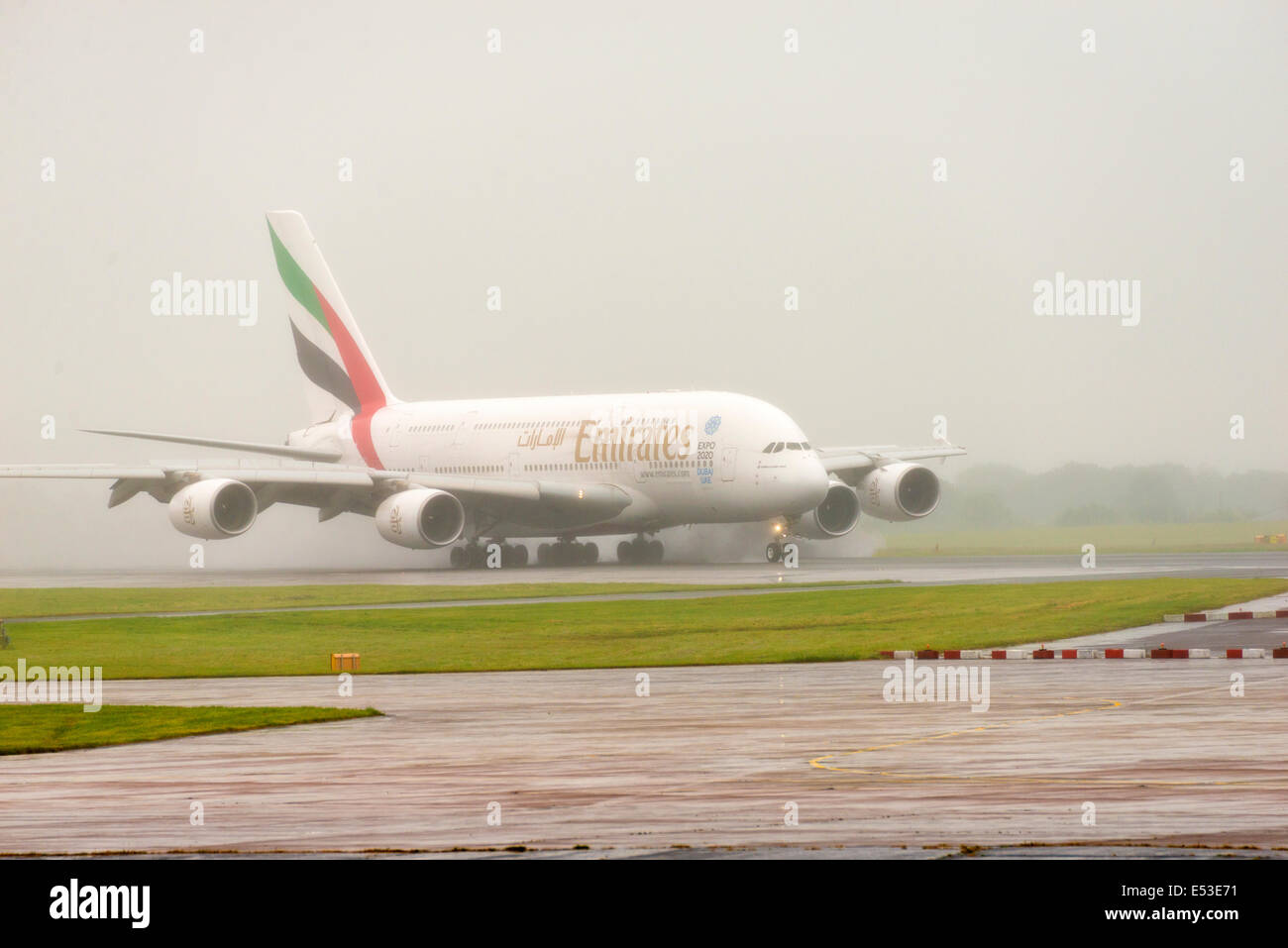 Manchester Airport in rain and fog arrivals and departures Stock Photo