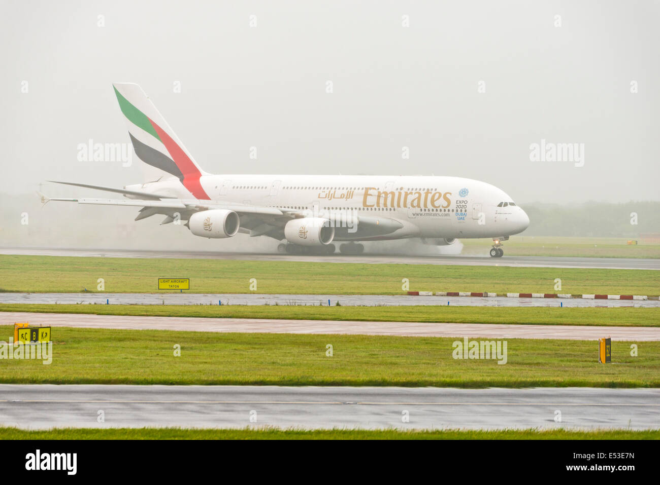 Manchester Airport in rain and fog arrivals and departures Stock Photo