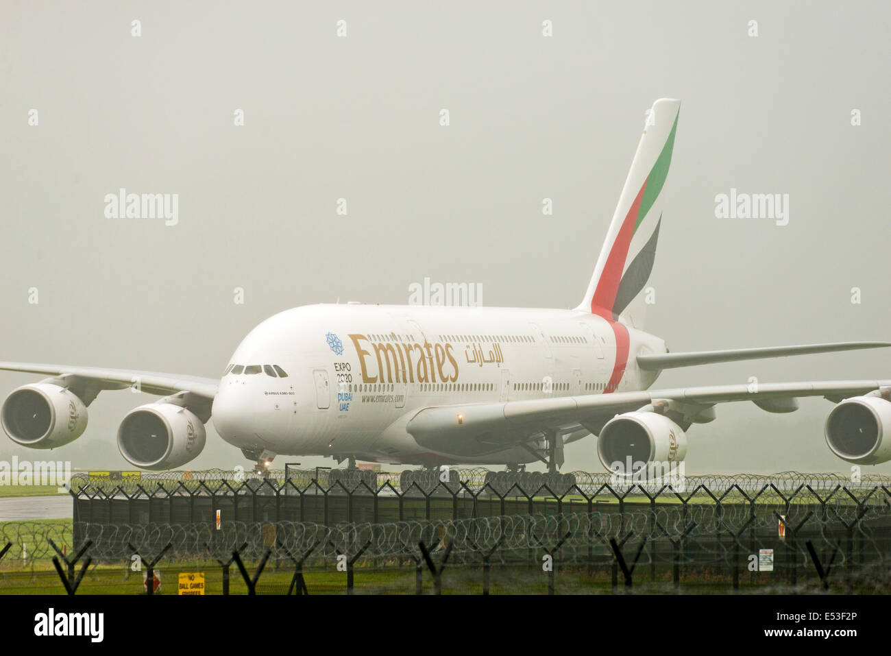 Manchester Airport in rain and fog arrivals and departures Stock Photo