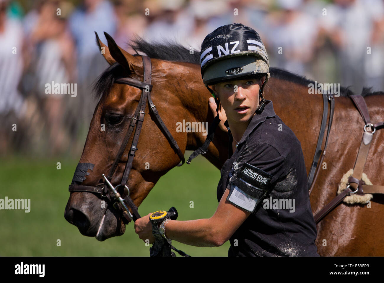 Aachen, Germany. 19th July, 2014. New Zealand rider Lucy Jackson pets her horse Willy Do after her fall during the cross-country discipline of the eventing event of the CHIO in Aachen, Germany, 19 July 2014. Photo: ROLF VENNENBERND/DPA/Alamy Live News Stock Photo