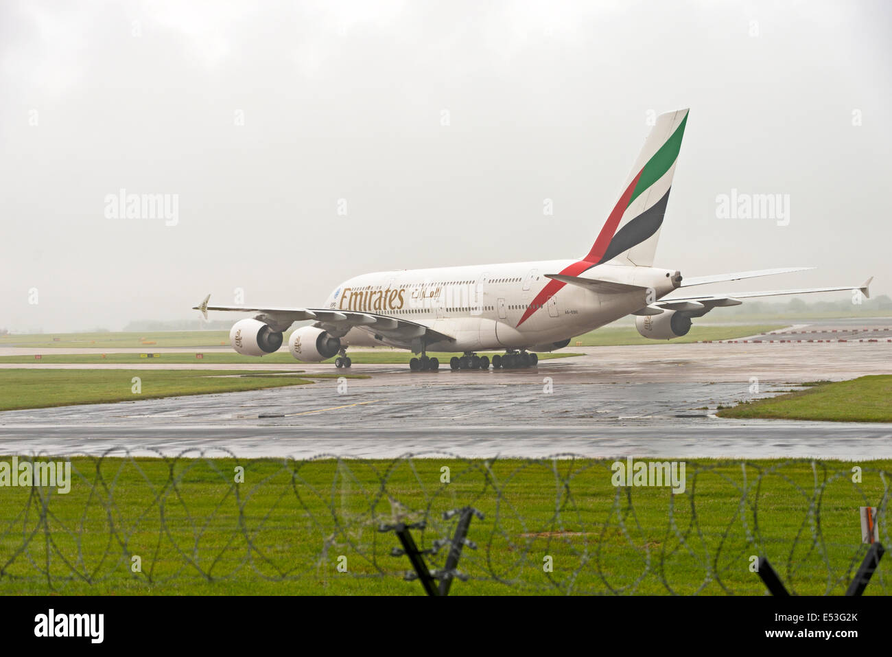 Manchester Airport in rain and fog arrivals and departures Stock Photo