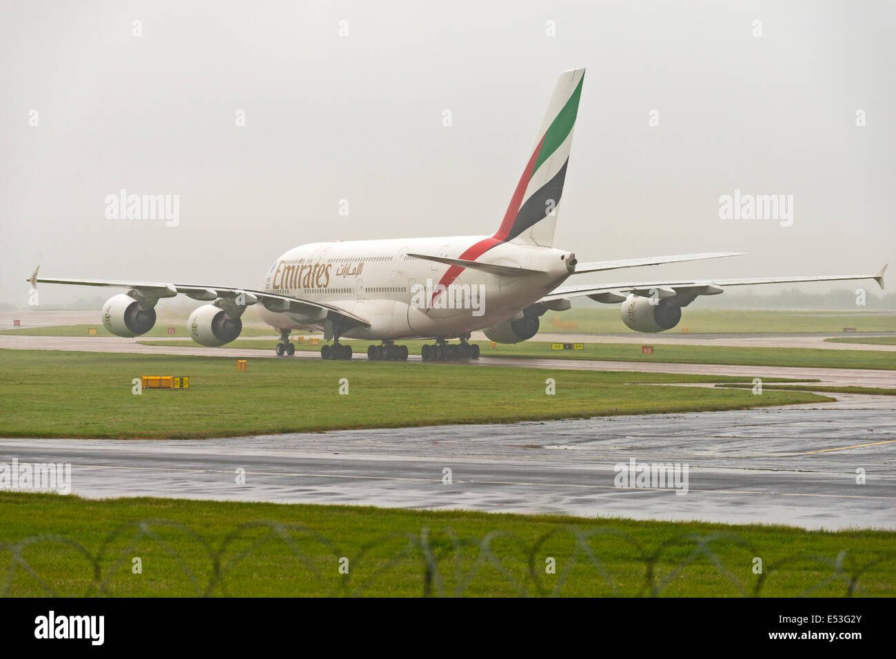 Manchester Airport in rain and fog arrivals and departures Stock Photo