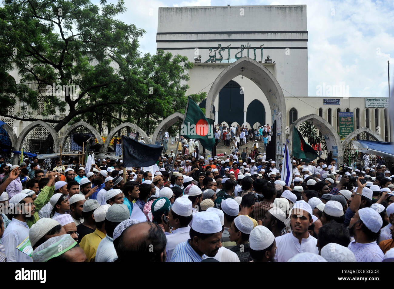 People take mass protest after the 'Jumma' or Friday prayer, against Israeli attack on Gaza in front of Baitul Mukarram Mosque in Dhaka. The protesters are from various Islamic political parties condemning the silence of the UN on Israels' continuous pounding in Gaza, and now demanding to create Islamic United Nations. Credit:  Mohammad Asad/Pacific Press/Alamy Live News Stock Photo