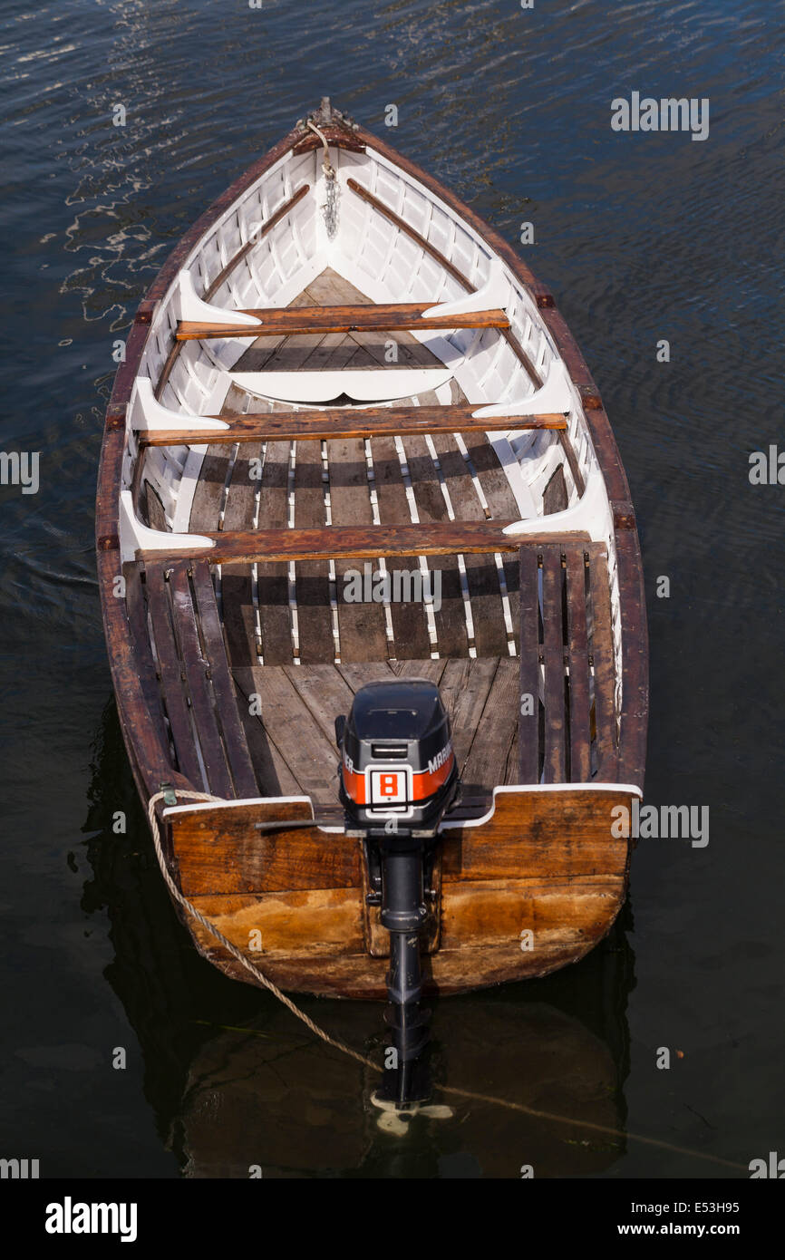 Small wooden boat with outboard motor moored in Kinsale, County Cork, Ireland. Stock Photo