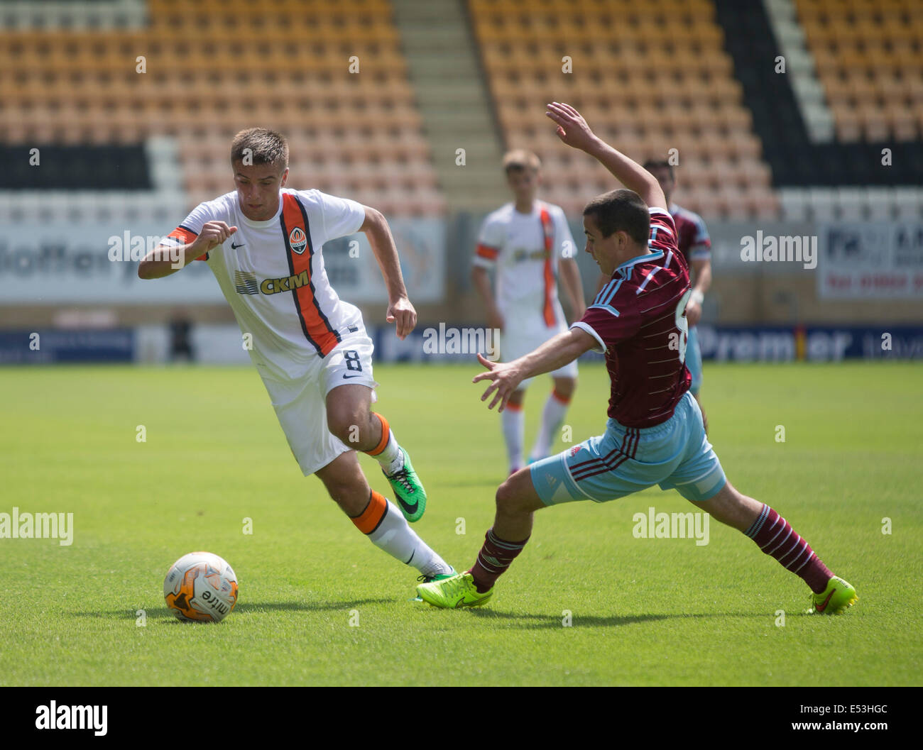 Cambridge, UK. 19th July, 2014. Pre Season Friendly. Shakhtar Donetsk versus West Ham United in the Absolute Sports Travel Cup. Yevgen Yefremov of Shakhtar Donetsk (left) and Josh Cullen of West Ham United. Credit:  Action Plus Sports/Alamy Live News Stock Photo