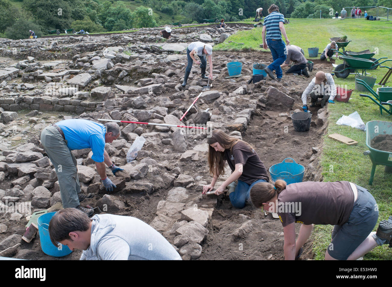 Volunteers excavating the remains at Vindolanda Roman Fort Northumberland England UK Stock Photo