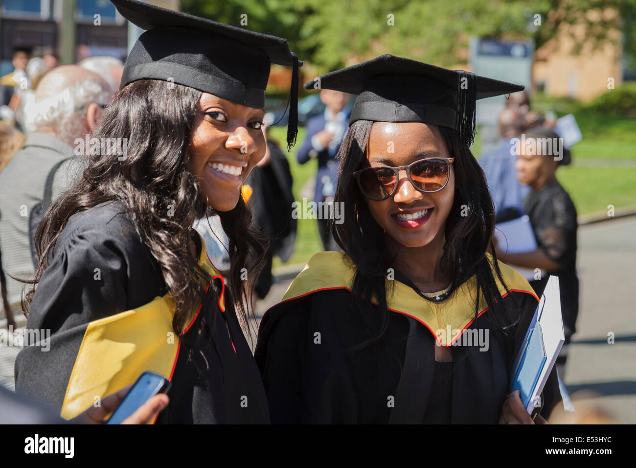 Two female students  at University graduation day, Keele University, UK Stock Photo