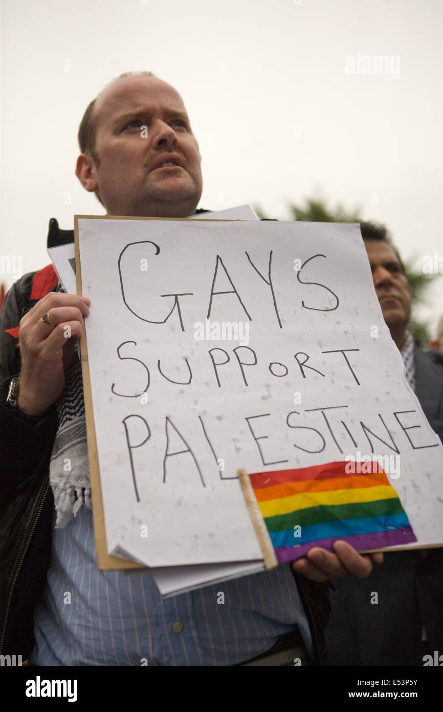 Belfast City Hall,Saturday,19 July 2014. A member from the LGBT group supporting Palestine at the ICTU Rally where there were demands made for an immediate Ceasefire in Gaza Credit:  Bonzo/Alamy Live News Stock Photo