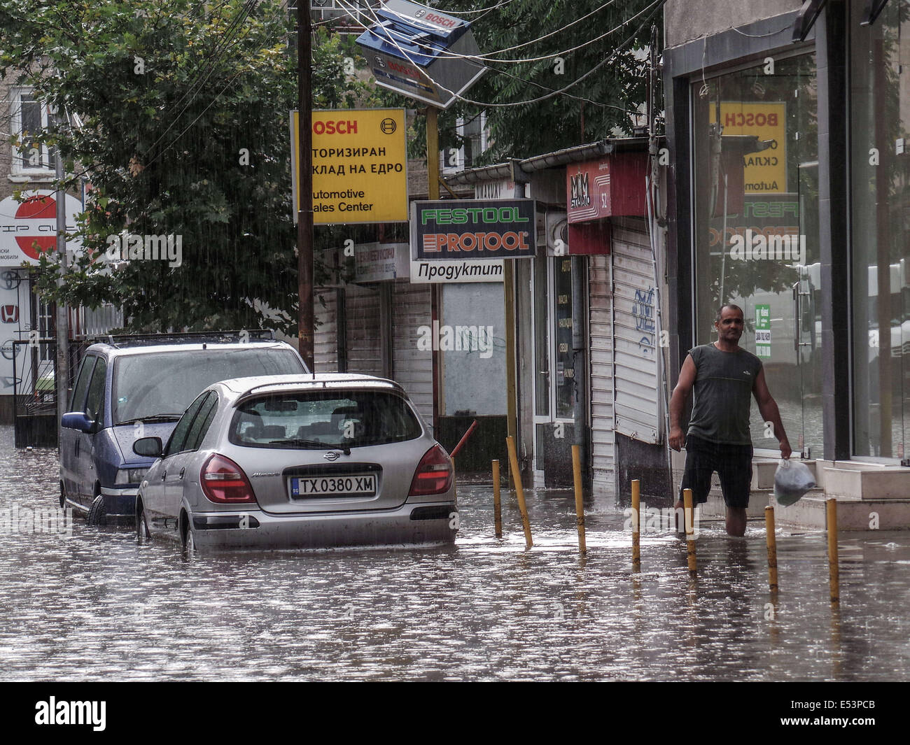 Heavy rain and storm hit the Black sea town of Varna, some 450 kms. 19th July, 2014. (260 miles) north-east of the Bulgarian capital Sofia, Saturday, July, 19, 2014. The heavy rain leaving dozens of homes and hundreds cars under the water, causing communication and electricity breakdowns in the town. The flood today is just a mont after the deadly flood in the town killed 13 people on June, 19, 2014. Photo by: Petar Petrov/Impact Press Group/NurPhoto Credit:  Petar Petrov/NurPhoto/ZUMA Wire/Alamy Live News Stock Photo