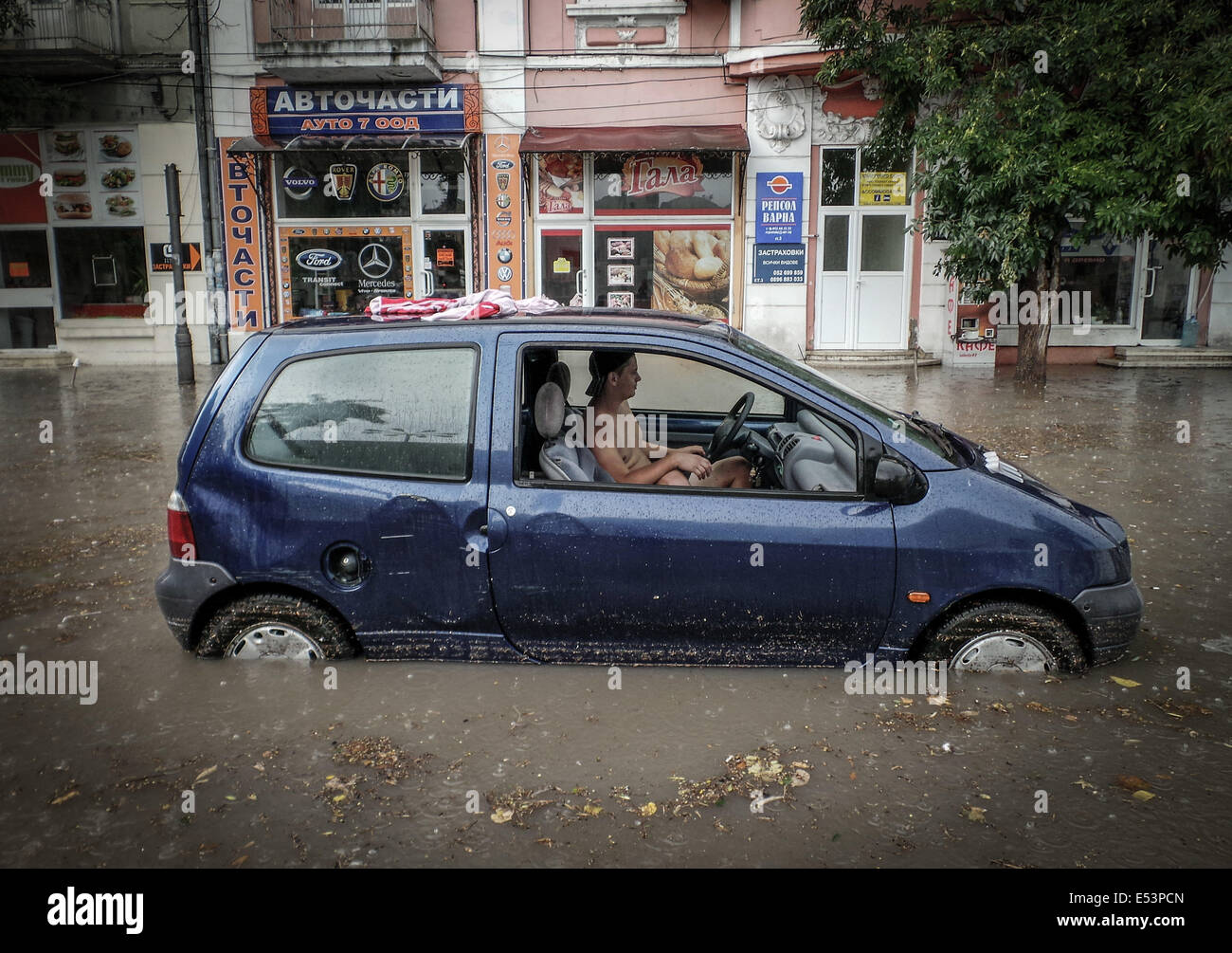 Heavy rain and storm hit the Black sea town of Varna, some 450 kms. 19th July, 2014. (260 miles) north-east of the Bulgarian capital Sofia, Saturday, July, 19, 2014. The heavy rain leaving dozens of homes and hundreds cars under the water, causing communication and electricity breakdowns in the town. The flood today is just a mont after the deadly flood in the town killed 13 people on June, 19, 2014. Photo by: Petar Petrov/Impact Press Group/NurPhoto Credit:  Petar Petrov/NurPhoto/ZUMA Wire/Alamy Live News Stock Photo