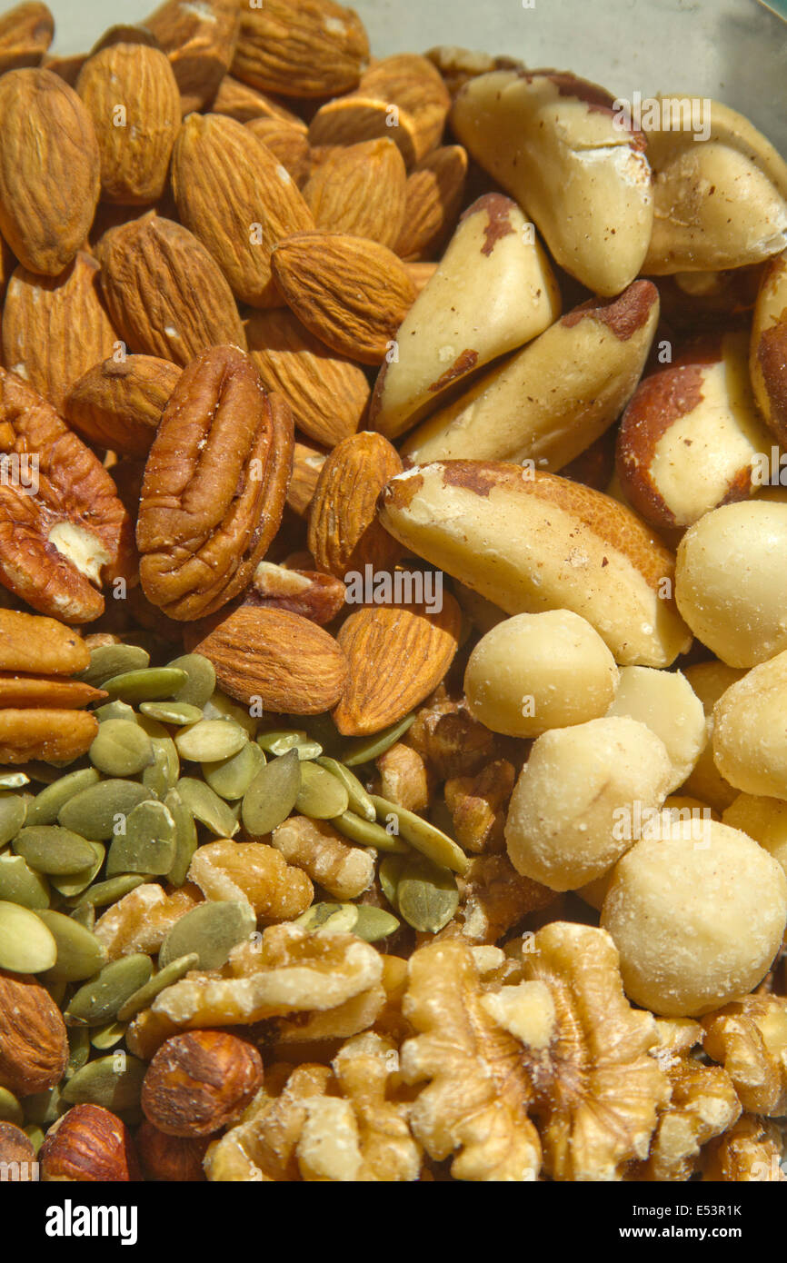 Close up of assorted healthy, raw, organic nuts Stock Photo