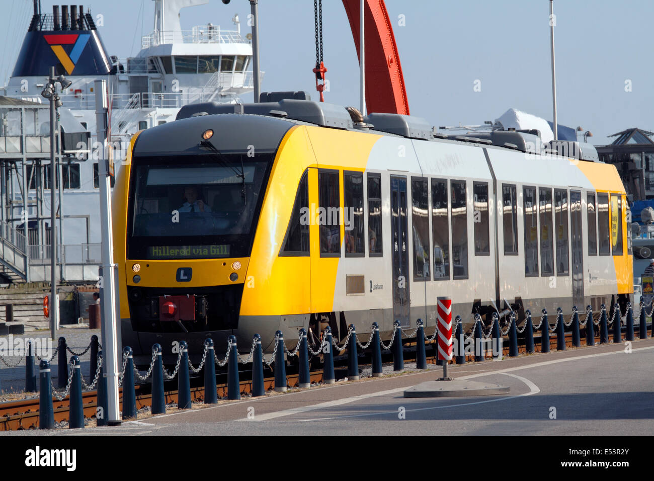 Local train to Gilleleje and Hillerød and Scandlines ferry to Sweden on the busy harbour area in the harbour of Elsinore, Helsingør, Sealand, Denmark. Stock Photo