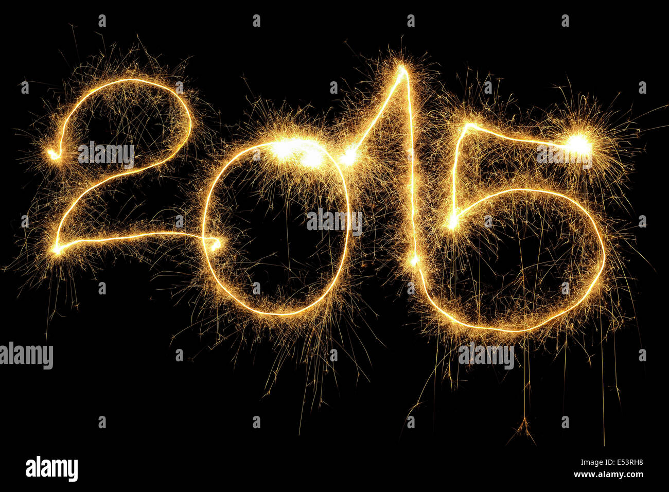 New Year 2015 formed from sparking digits over black background Stock Photo