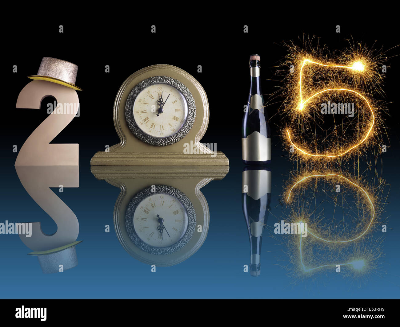 New Year 2015 set up of golden digit two, table clock, bottle of champagne and digit five created from burning sparkler Stock Photo