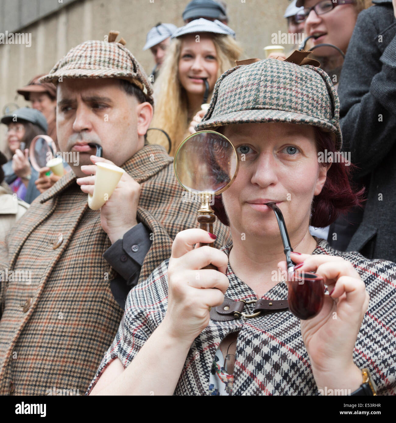 Dozens of fans dressed as Sherlock Holmes created by Sir Arthur Conan Doyle in a Guinness World Record Attempt in London. Stock Photo