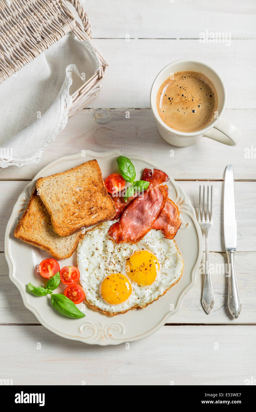 Eggs, toast and bacon for breakfast Stock Photo - Alamy