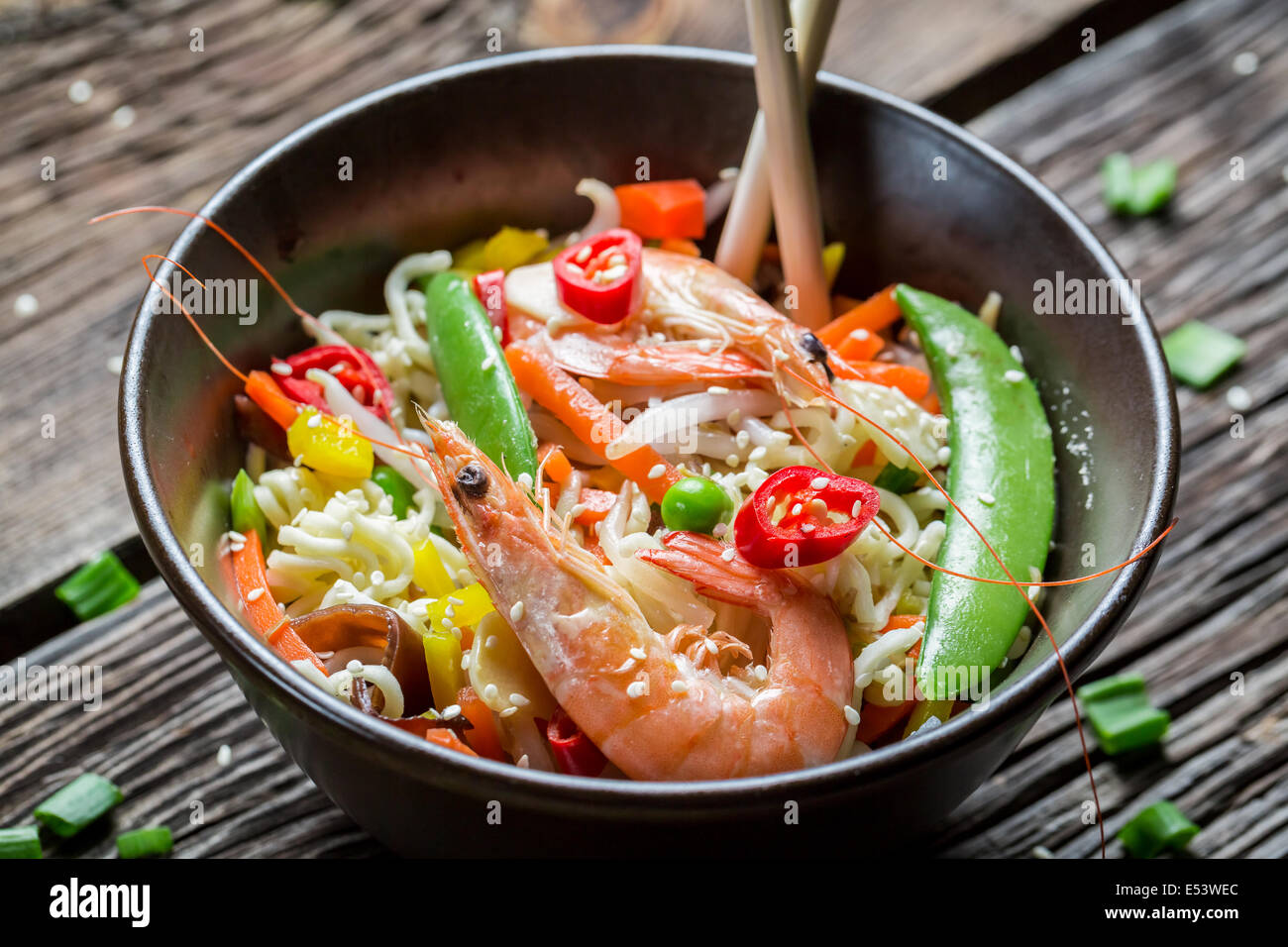 Shrimp with vegetables and noodles Stock Photo - Alamy
